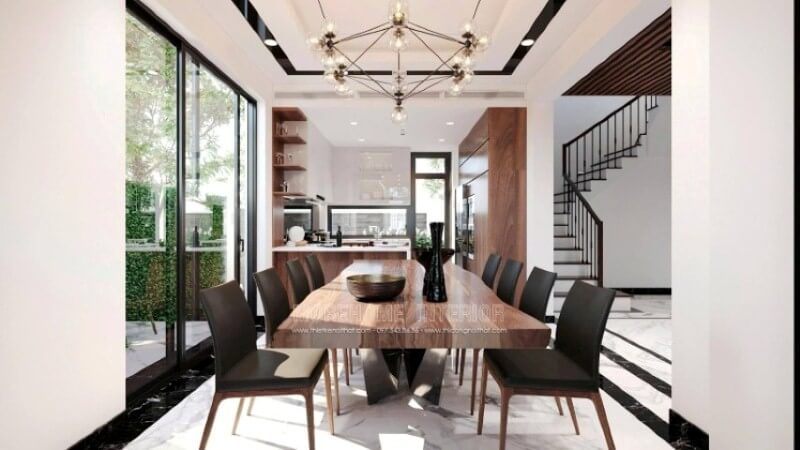 Trang trí nội thất phòng ăn hiện đại ấn tượng với cách phối màu độc đáo giữa tone màu gỗ trầm ấm kết hợp cùng gam màu sáng từ đá lát sàn.