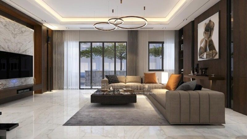 Với không gian rộng lớn, việc thế kế đòi hỏi phải làm sao để nó mang lại cảm giác gần gũi, Morehome xin gợi ý ý tưởng trong thiết kế nội thất biệt thự Park city trong đây, phòng khách với tone màu trầm kết hợp cách trang trí khéo léo từ tấm gỗ ốp tường, tranh canvas, sofa góc, đá đối vân trang trí.